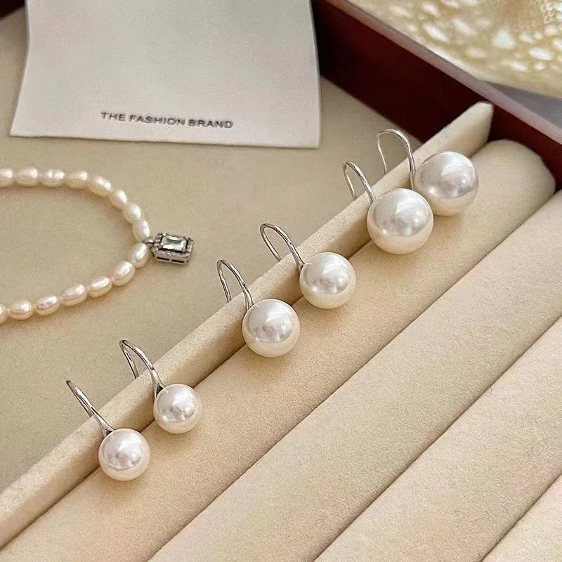 Sculptural 925 Sterling Silver Round Shell Pearl Hook Earrings
