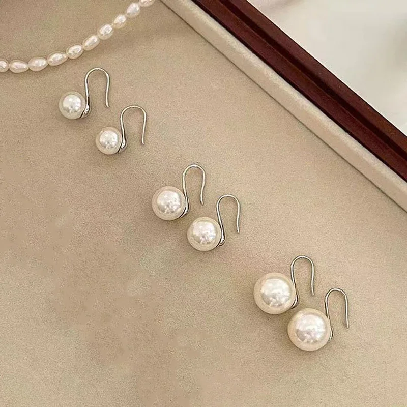 Sculptural 925 Sterling Silver Round Shell Pearl Hook Earrings