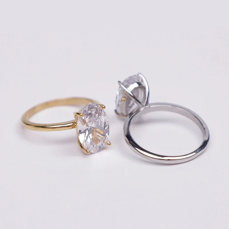 Polished Stainless Steel Oval Four-Prong Solitaire Ring