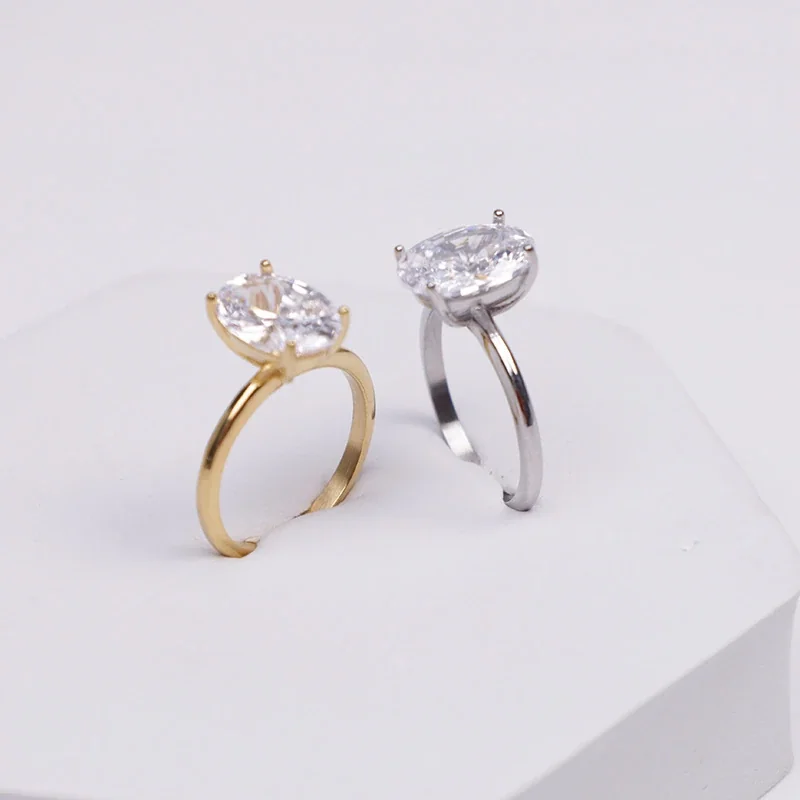 Polished Stainless Steel Oval Four-Prong Solitaire Ring