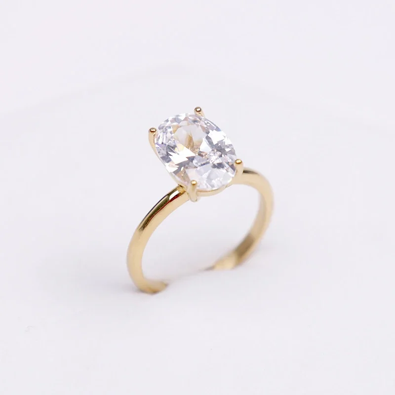 Polished Stainless Steel Oval Four-Prong Solitaire Ring - Gold