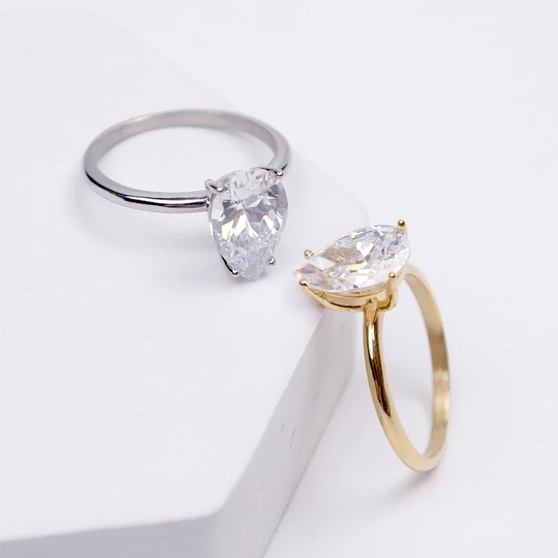 Refined Stainless Steel Pear-Cut CZ Four-Prong Ring