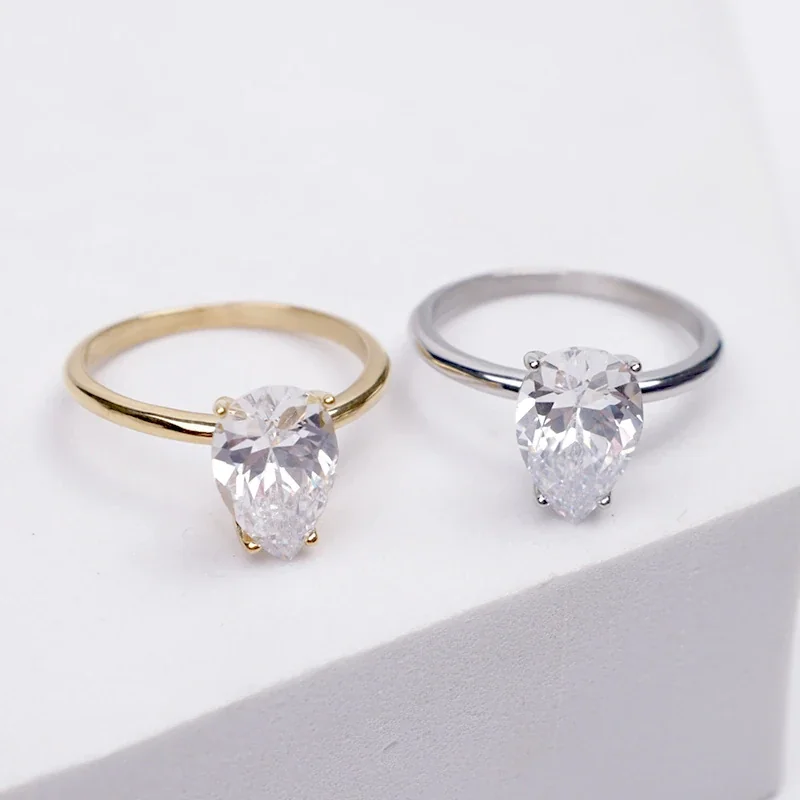 Refined Stainless Steel Pear-Cut CZ Four-Prong Ring