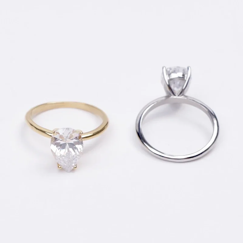 Refined Stainless Steel Pear-Cut CZ Four-Prong Ring