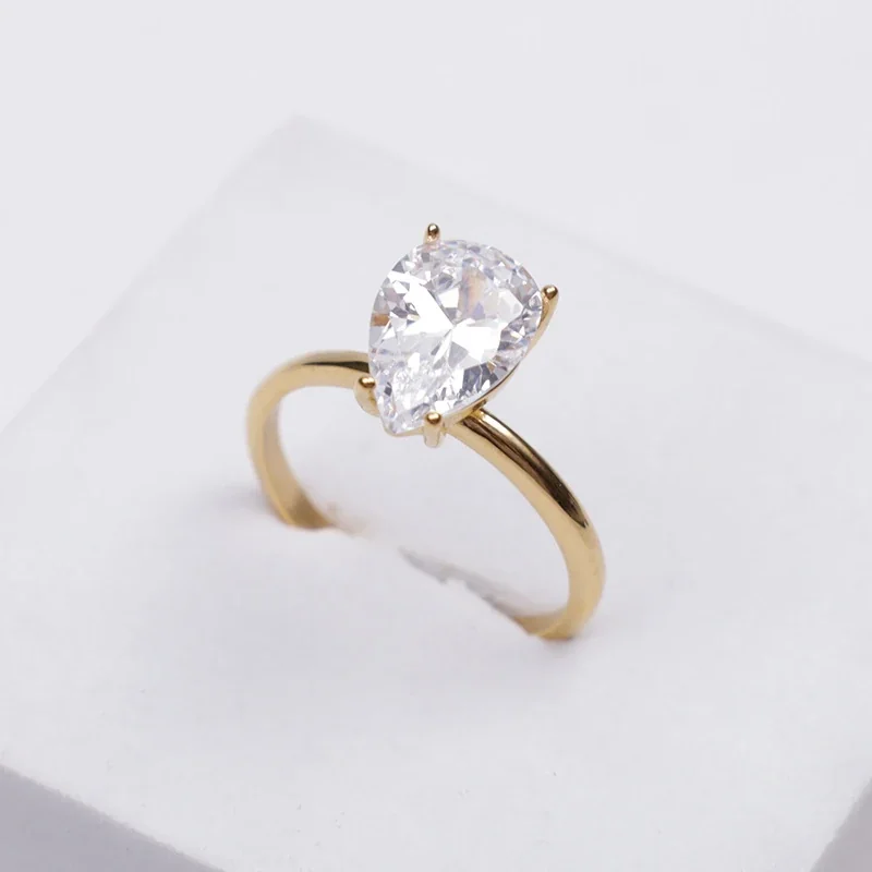 Refined Stainless Steel Pear-Cut CZ Four-Prong Ring - Gold