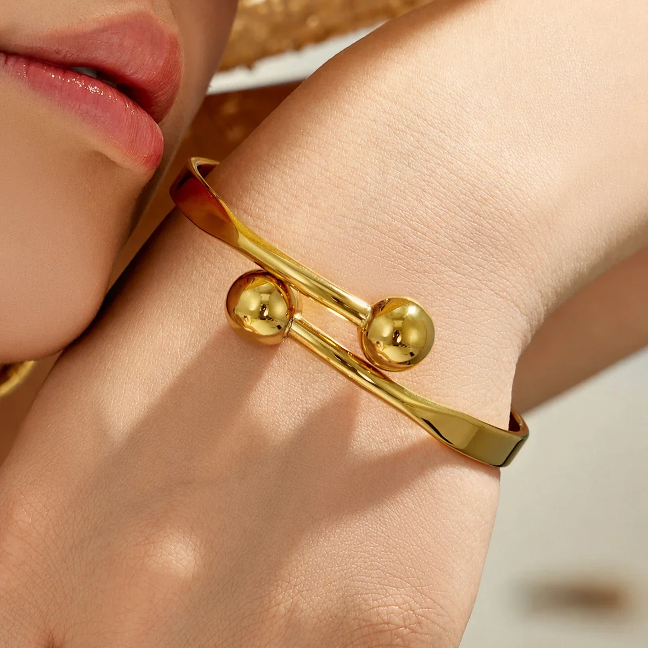 Sculptural Gold-Plated Double Ball Open Bangle