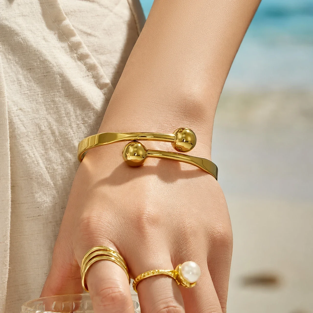 Sculptural Gold-Plated Double Ball Open Bangle