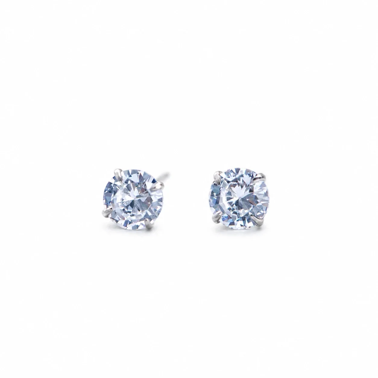 Vivid Round Four-Prong 925 Sterling Silver Stud Earrings - White