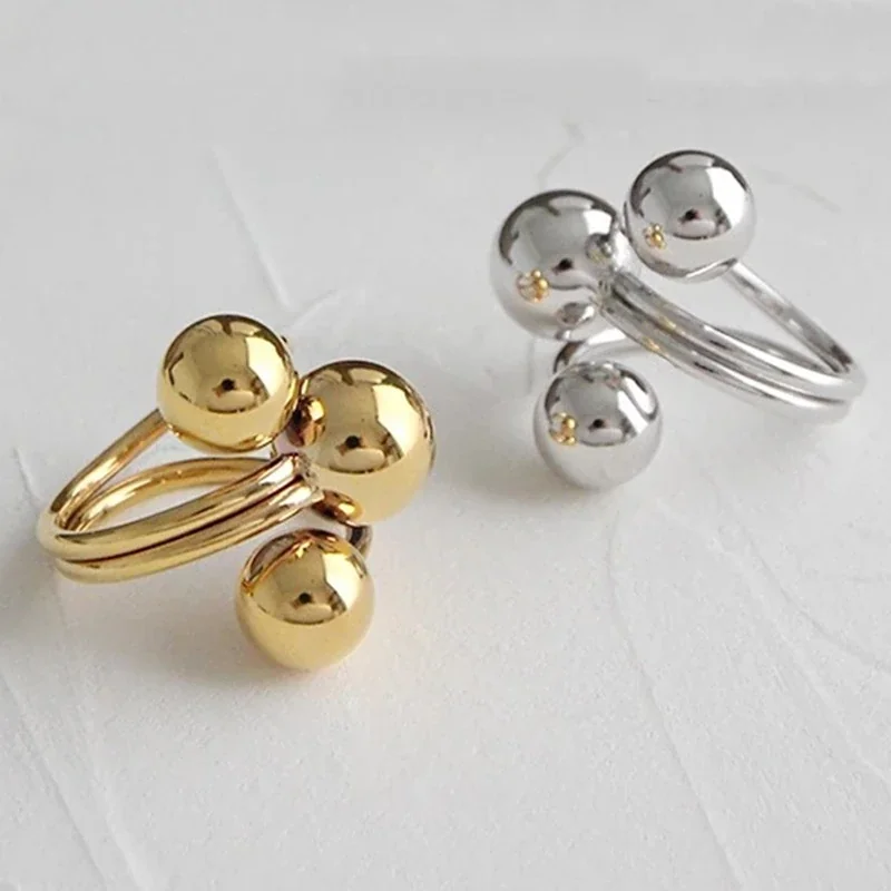 Orbital Gold-Plated Triple Ball Open Copper Ring