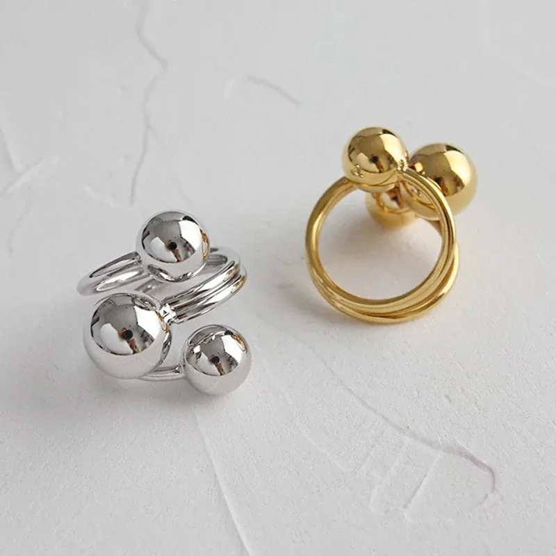 Orbital Gold-Plated Triple Ball Open Copper Ring