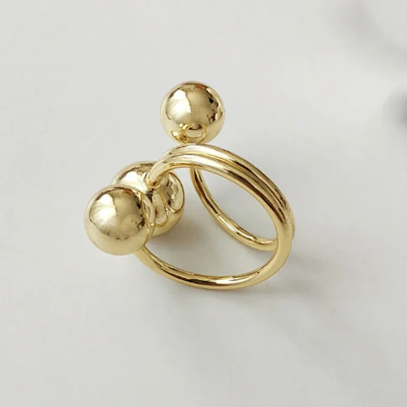 Orbital Gold-Plated Triple Ball Open Copper Ring