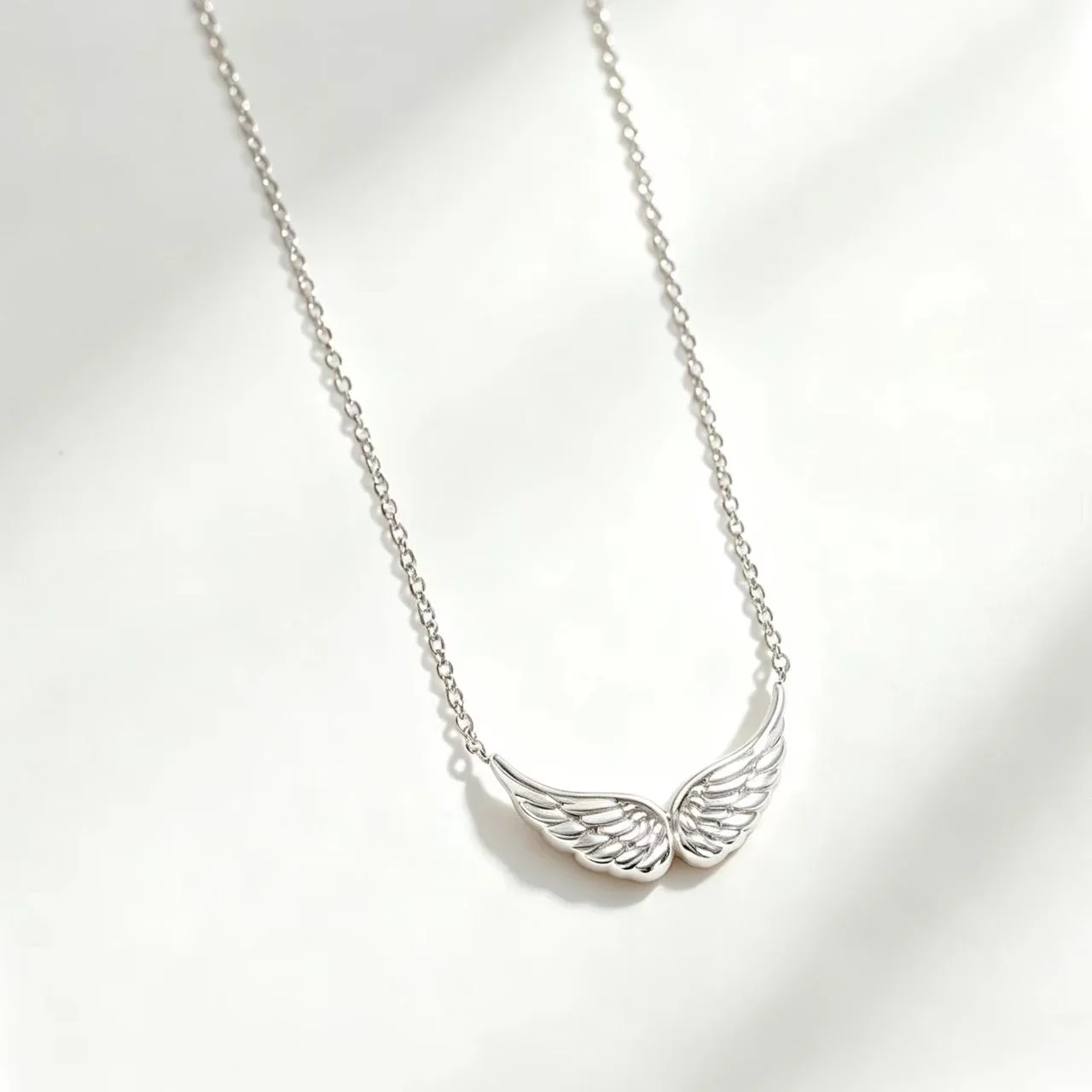 Polished Stainless Steel Twin Feathered Wing Necklace