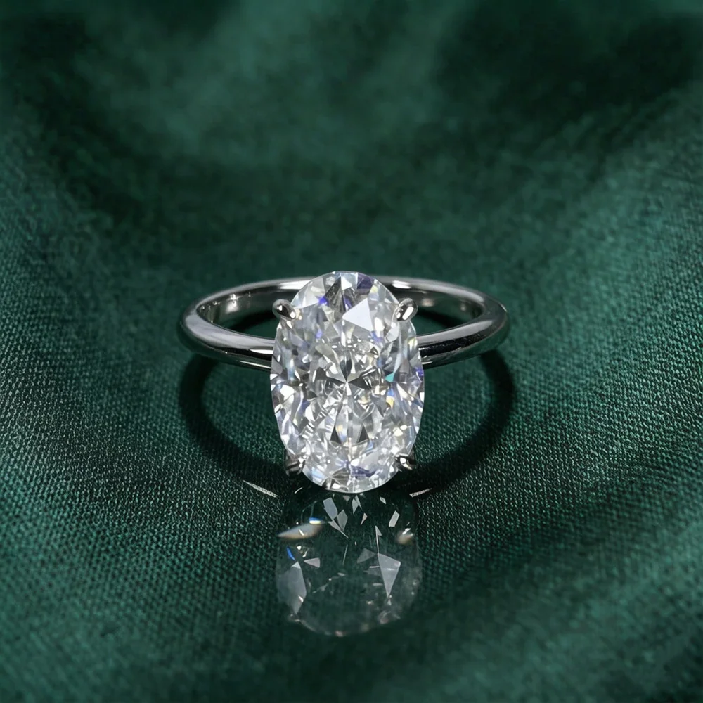 Refined 925 Sterling Silver Oval Four-Prong Moissanite Ring