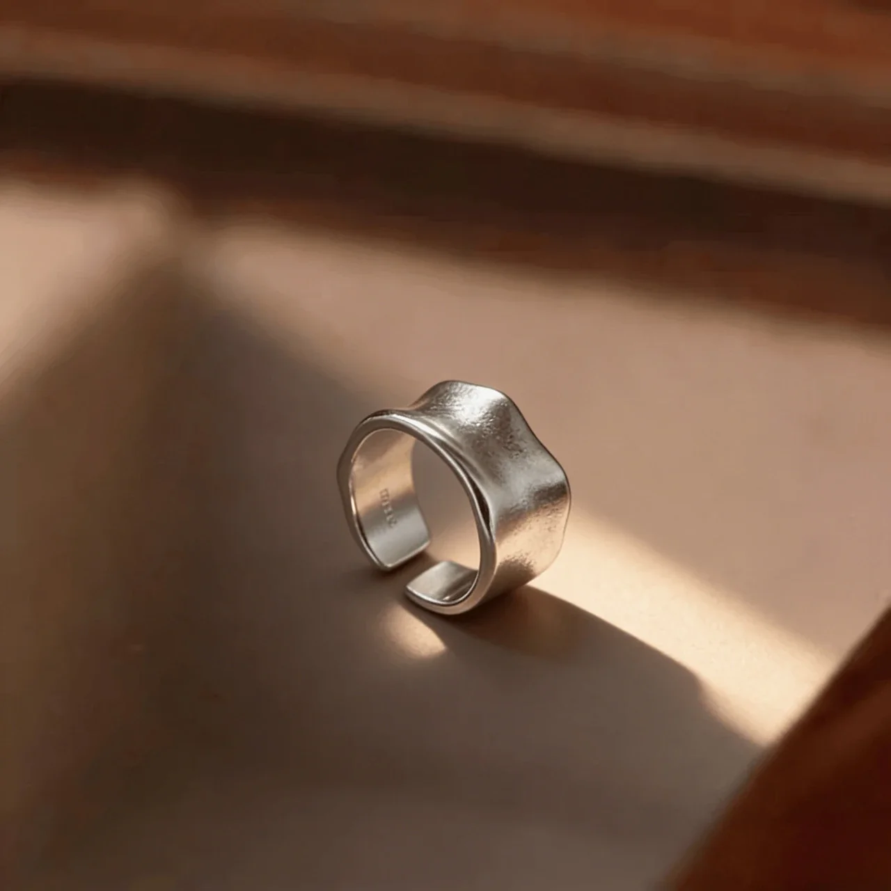 Sculptural 925 sterling silver wavy wide-band open ring