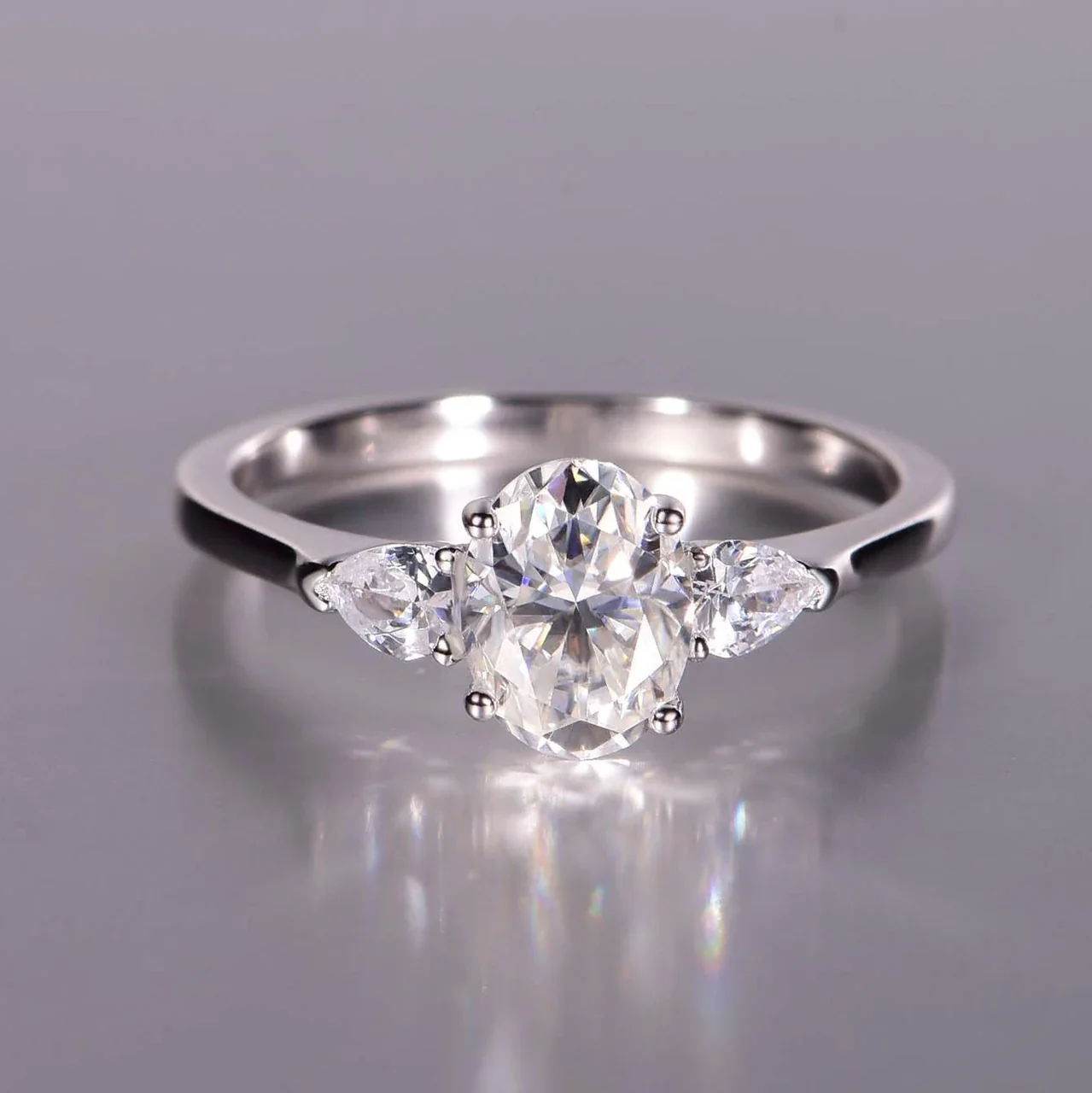 Elegant 925 Sterling Silver Oval & Pear Three-Stone Ring