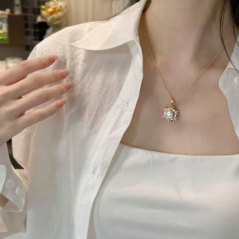 Radiant Gold-Plated Snowflake Baguette Pearl Pendant Necklace