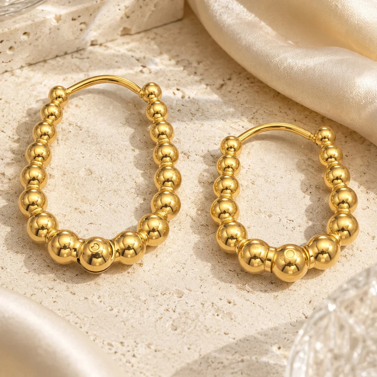 Polished Beaded Oval Stainless Steel Hoop Earrings