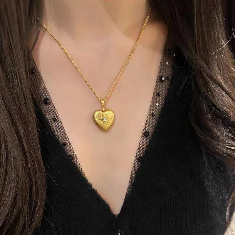 Brushed 925 Sterling Silver Heart Sunburst Pendant Necklace