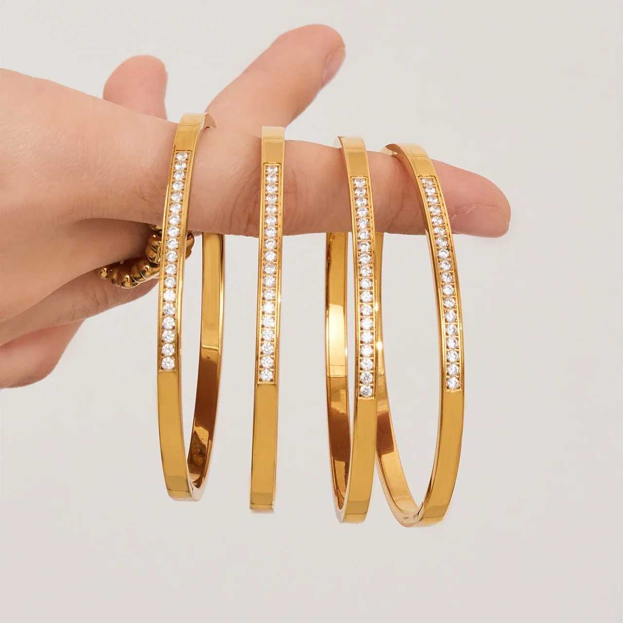 Refined Gold-Plated Round CZ Row Stainless Steel Bangle