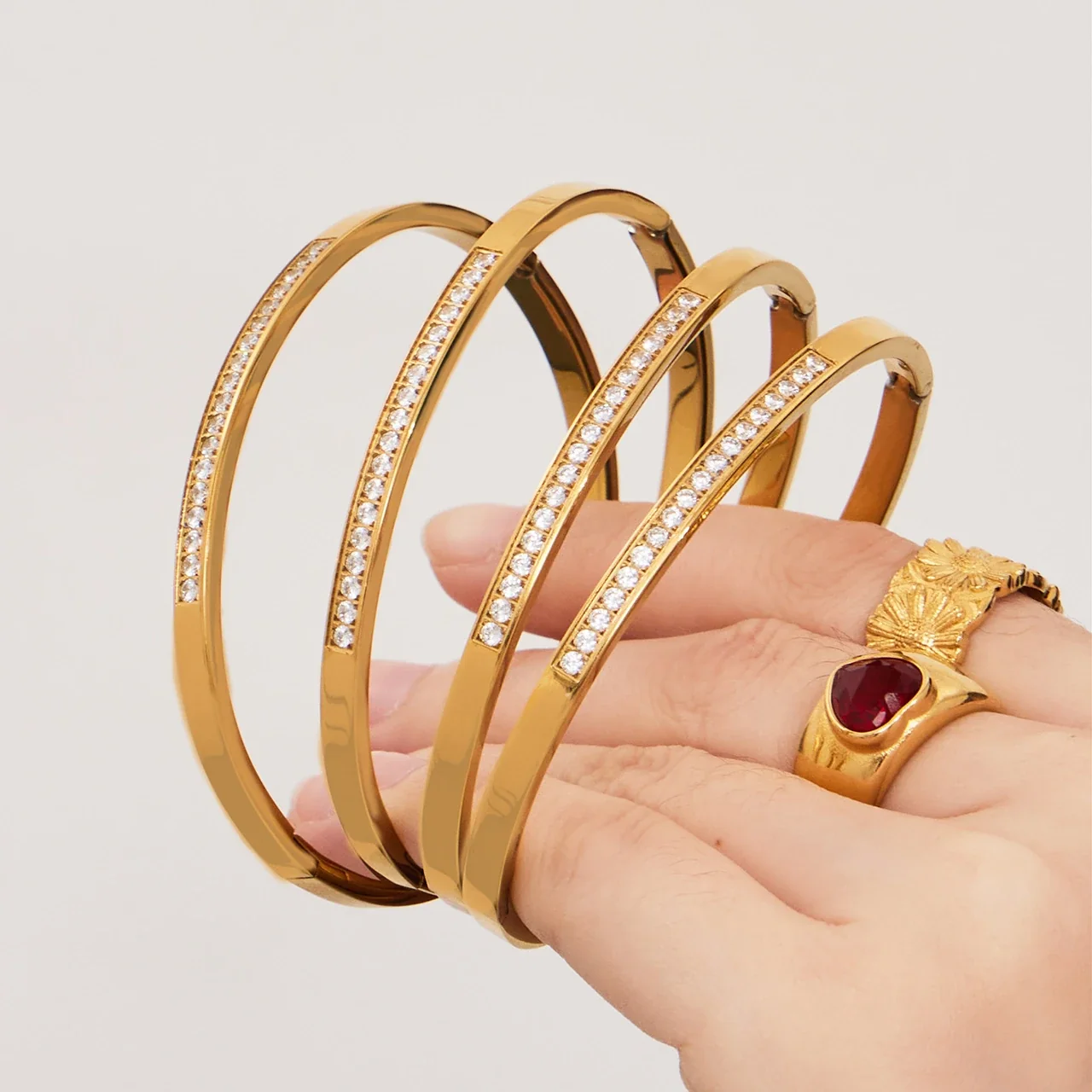Refined Gold-Plated Round CZ Row Stainless Steel Bangle