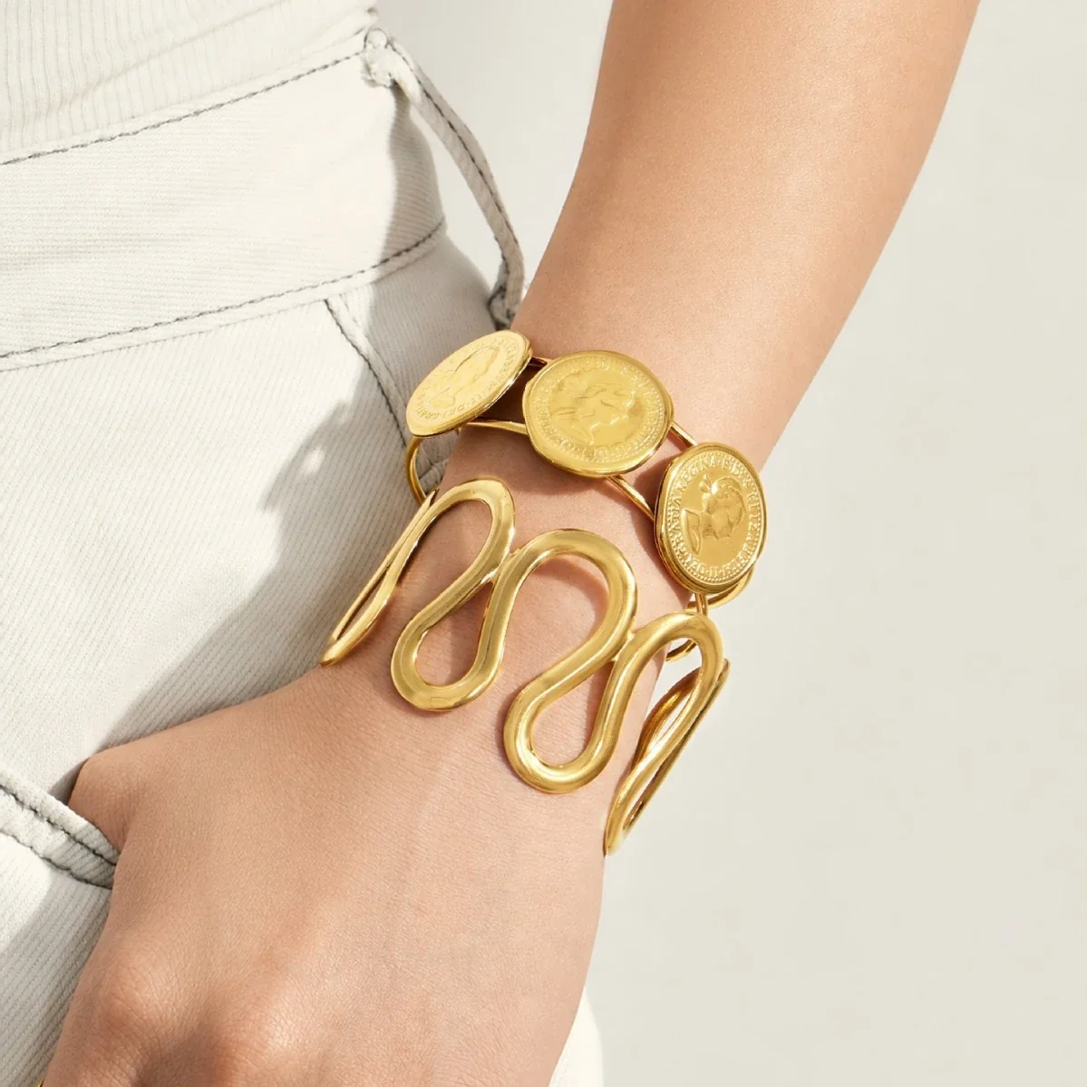 Sculptural Stainless Steel Open Wave Coin Bangle
