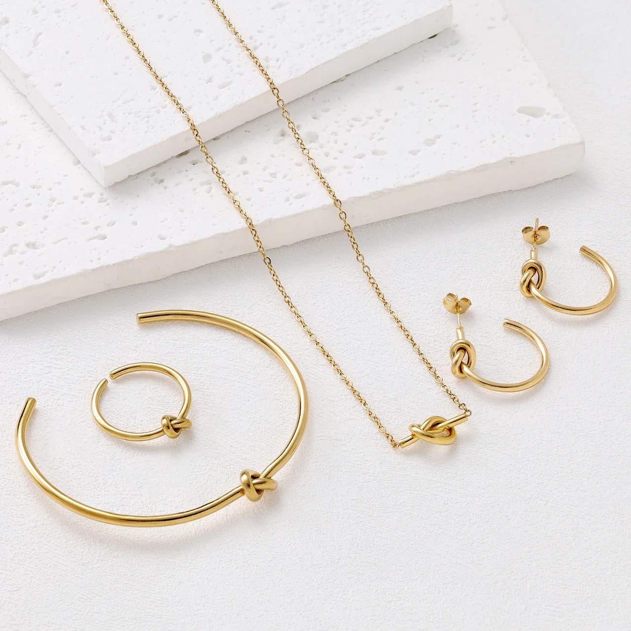 Sculptural Stainless Steel Knot Open-Cuff Jewelry Set - Set · Gold