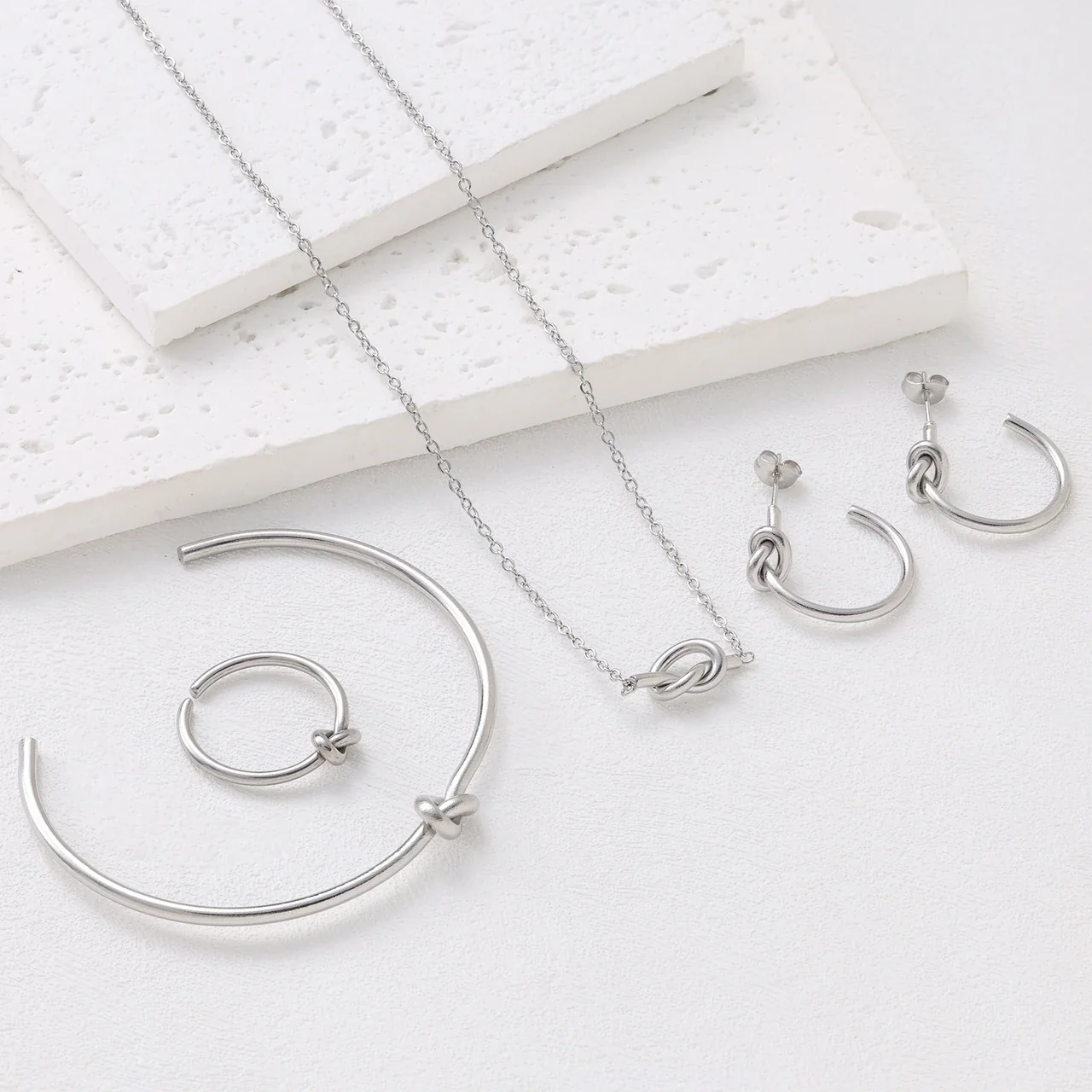 Sculptural Stainless Steel Knot Open-Cuff Jewelry Set - Set · Silver