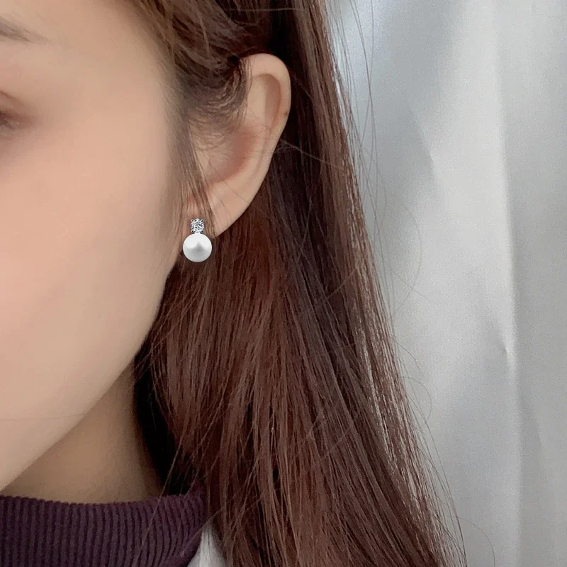 Luminous 925 Sterling Silver Four-Prong Pearl Stud Earrings