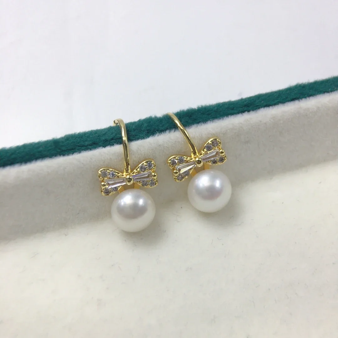 Delicate Gold-Plated Bow Baguette CZ Freshwater Pearl Drop Earrings - White