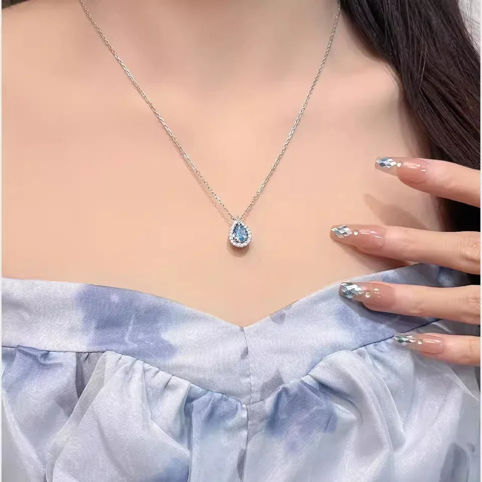 Luminous Blue Pear Halo 925 Sterling Silver Pendant Necklace