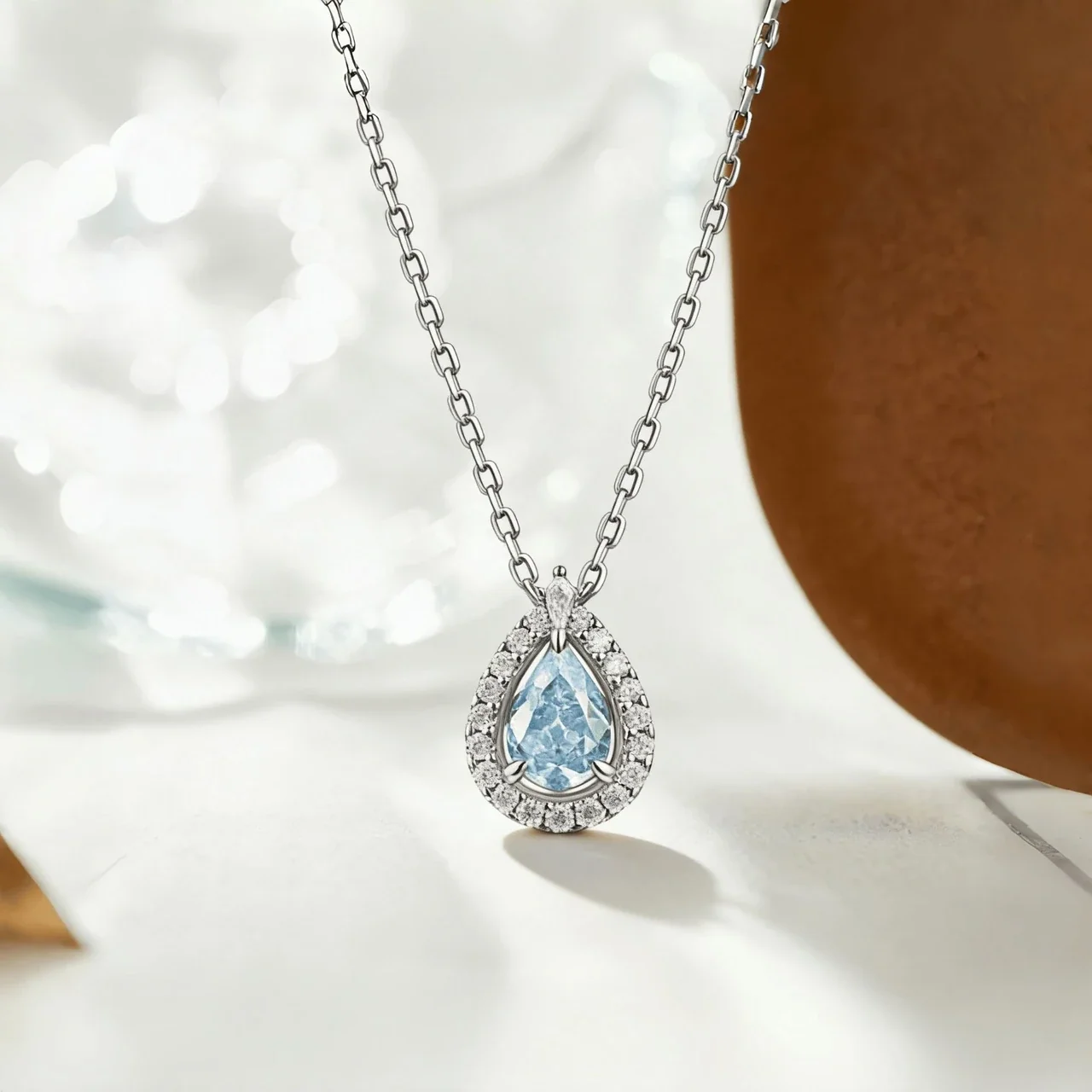 Luminous Blue Pear Halo 925 Sterling Silver Pendant Necklace
