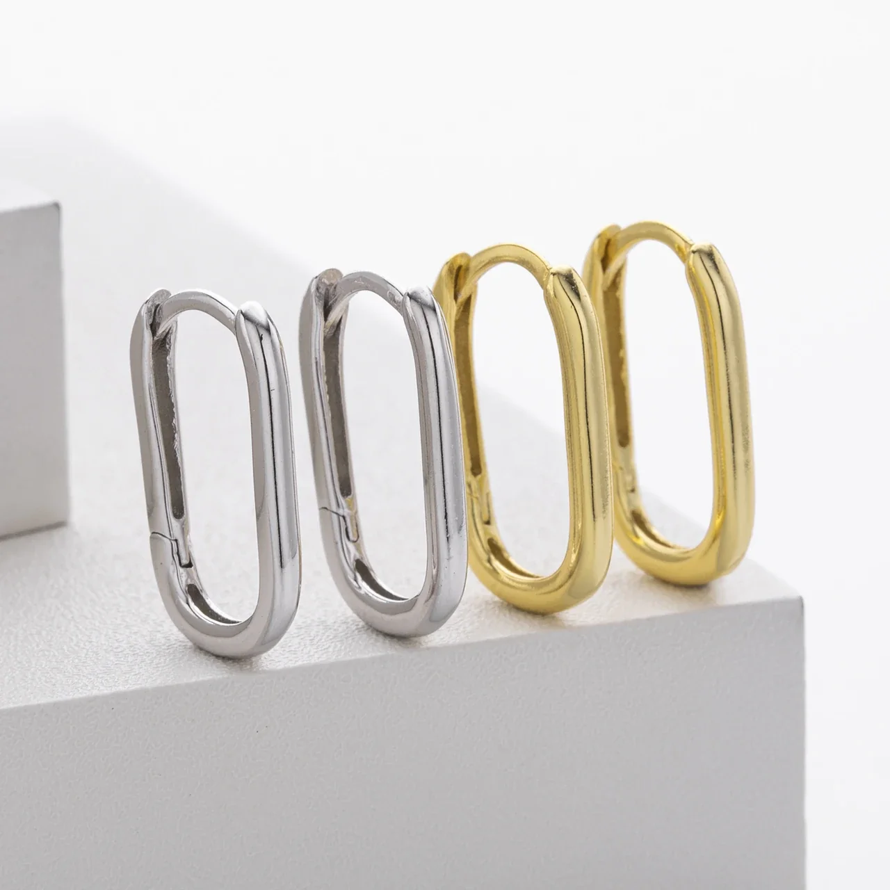 Sleek 925 Sterling Silver Oval Tubular Hoop Earrings