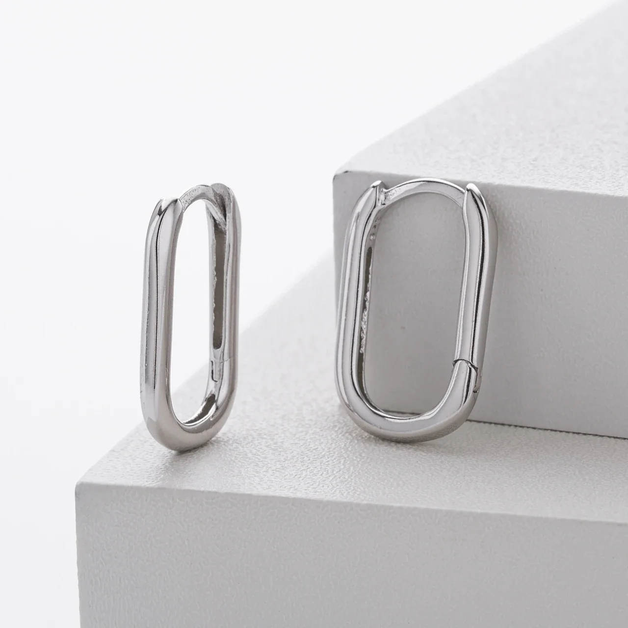Sleek 925 Sterling Silver Oval Tubular Hoop Earrings