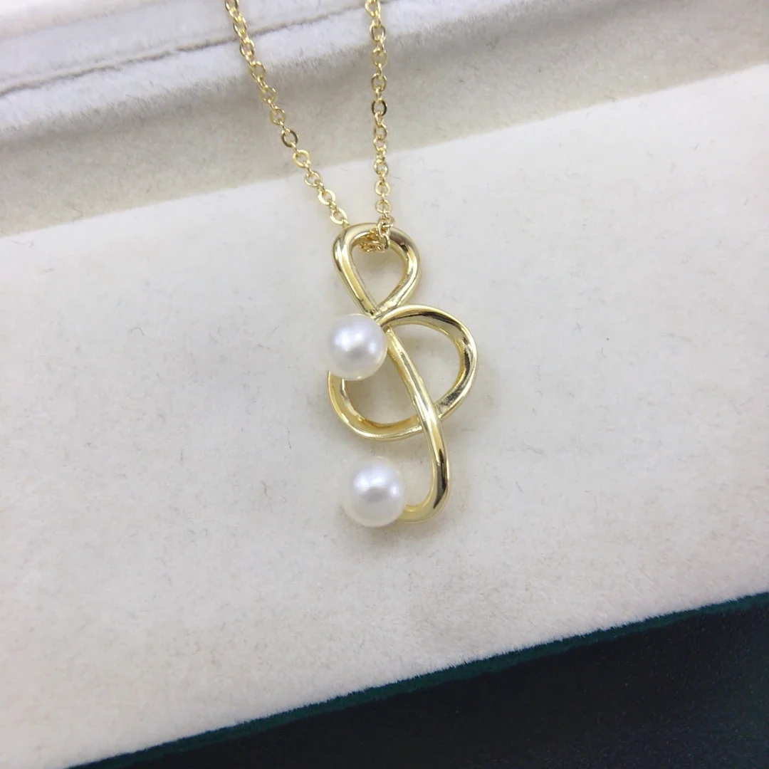 Lyrical Gold-Plated Treble Note Twin Pearl Pendant Necklace