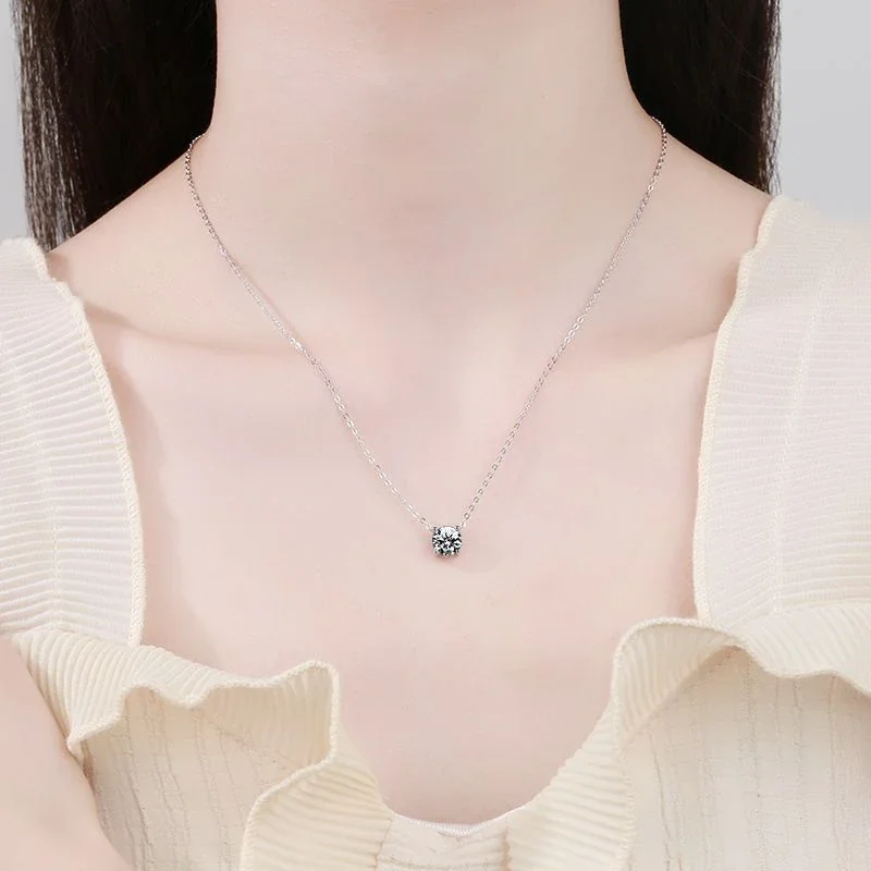 Refined 925 sterling silver round four-prong moissanite necklace