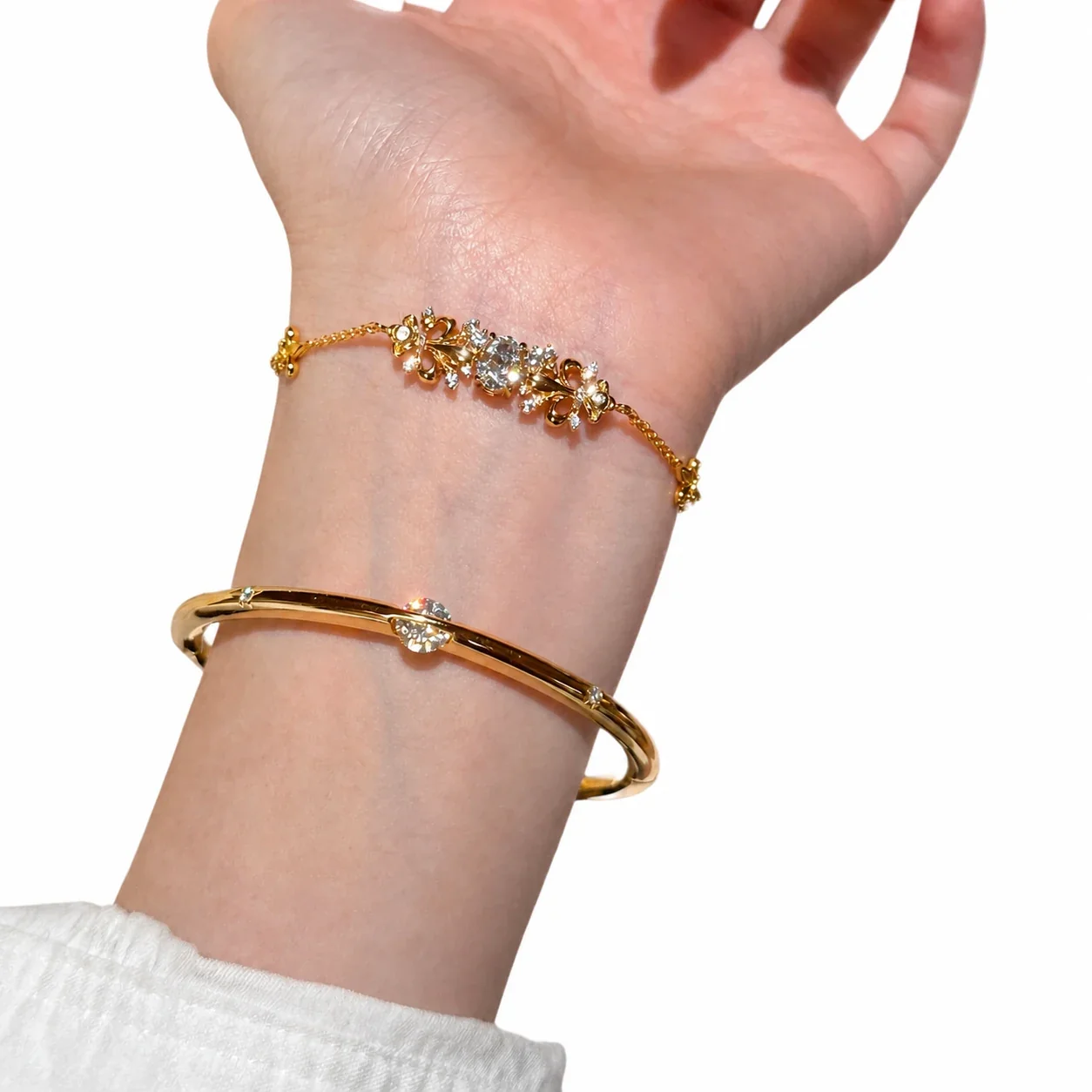 Ornate Gold-Plated Iris Motif Round Cubic Zirconia Copper Bracelet
