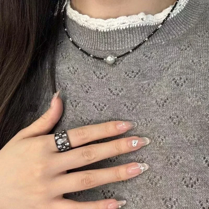Ornate Black-Plated Copper Lattice Pear CZ Ring