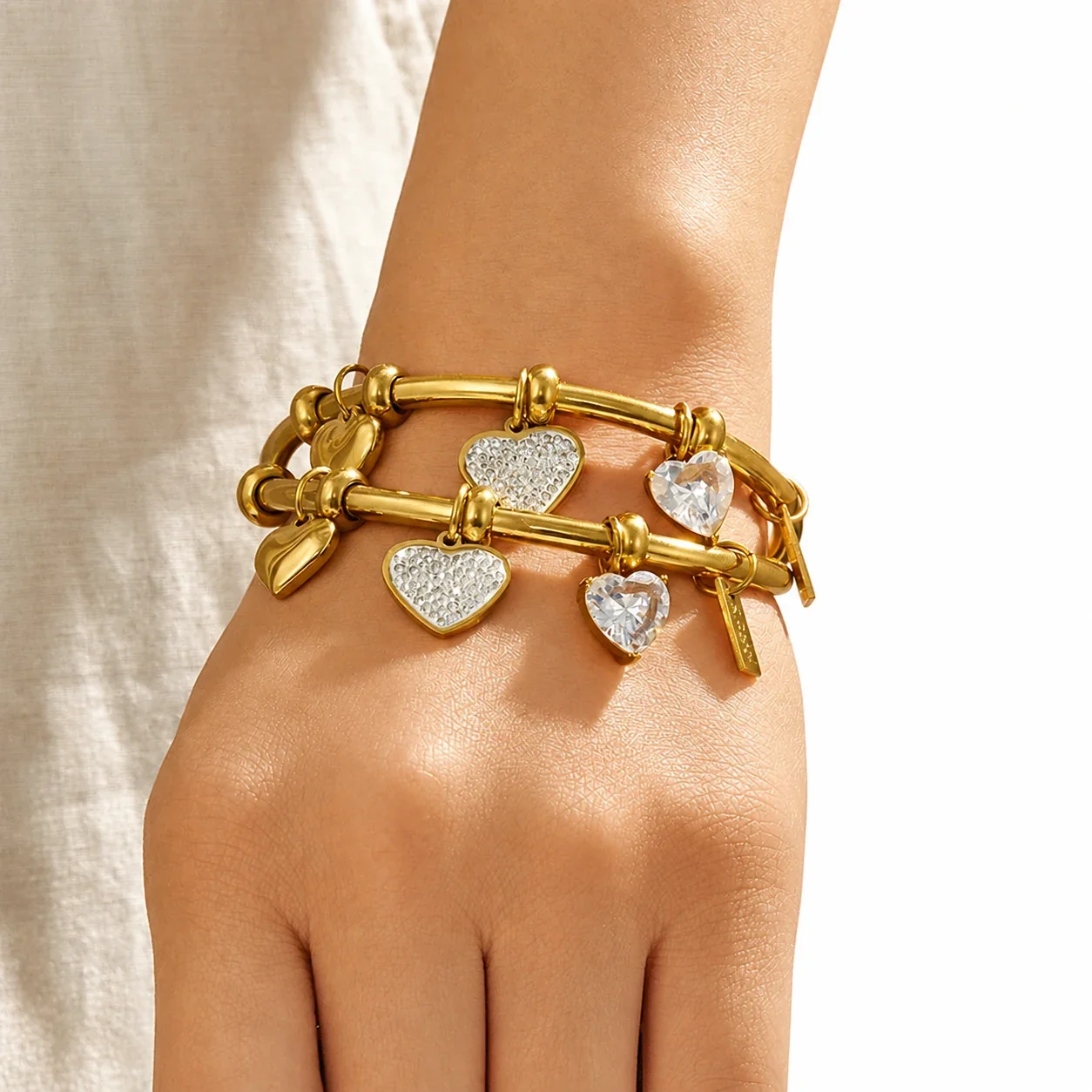 Playful 18K Gold PVD Stainless Steel Heart CZ Bangle