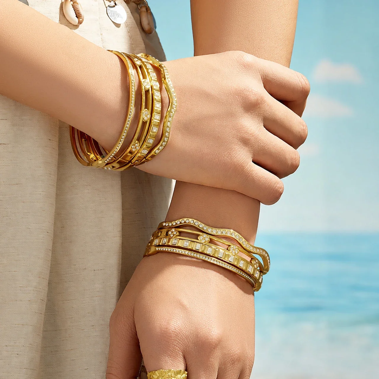 Radiant Gold PVD CZ Wave Flower Steel Bangle