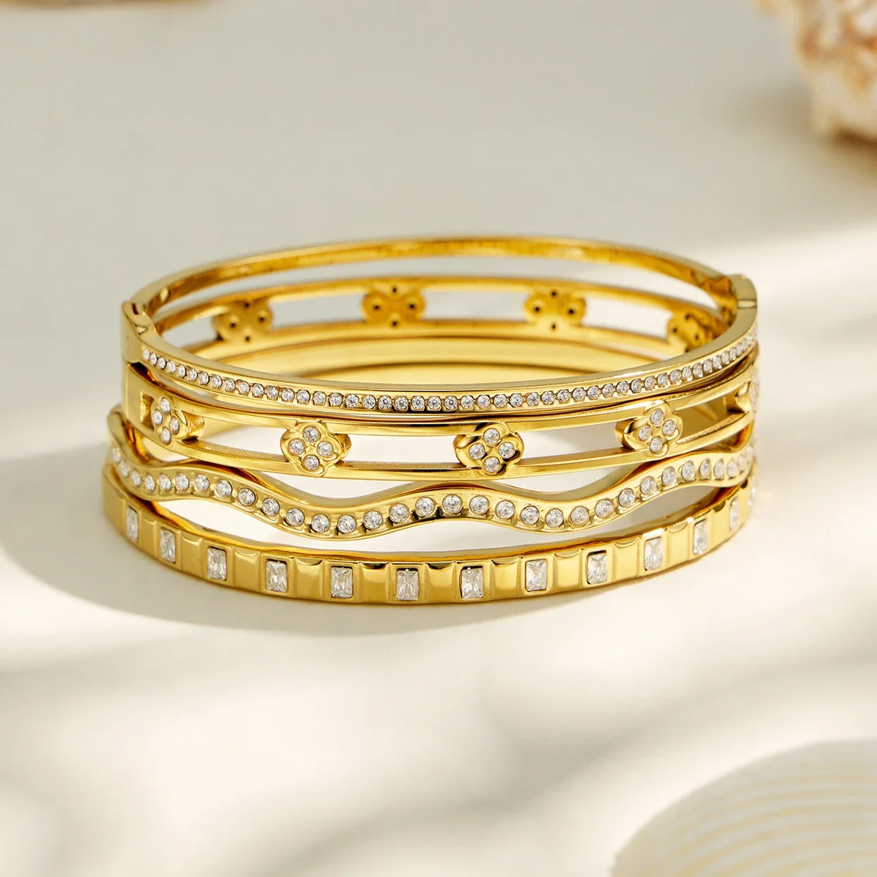 Radiant Gold PVD CZ Wave Flower Steel Bangle