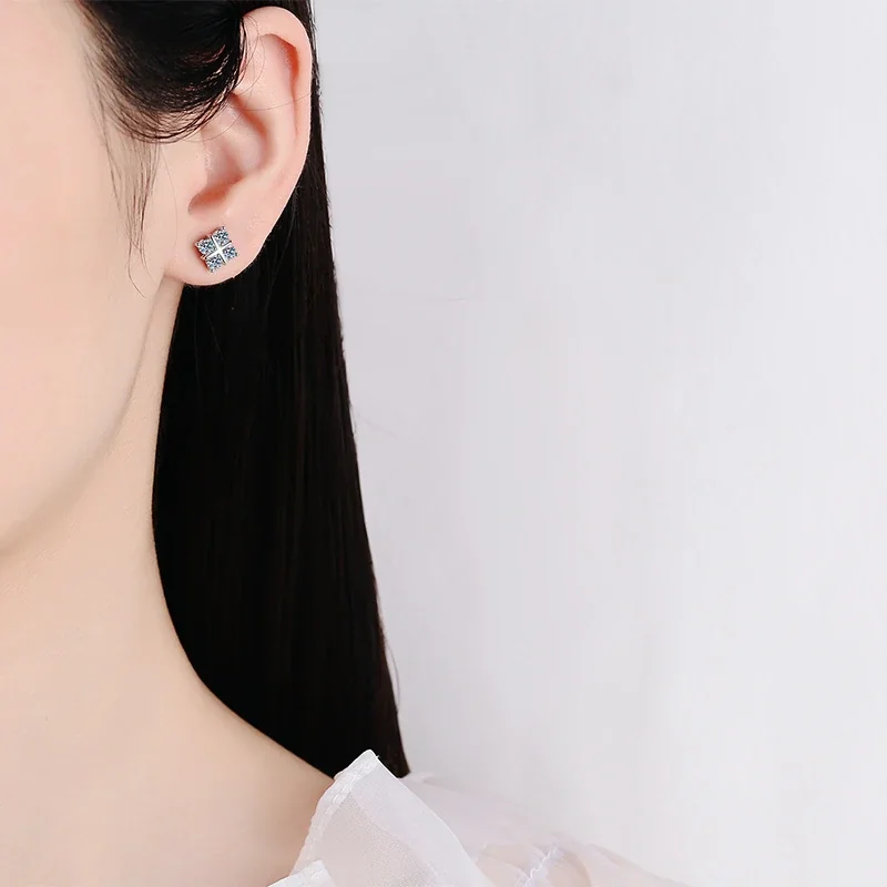 Delicate Platinum-Plated Four-Stone Cross Stud Earrings