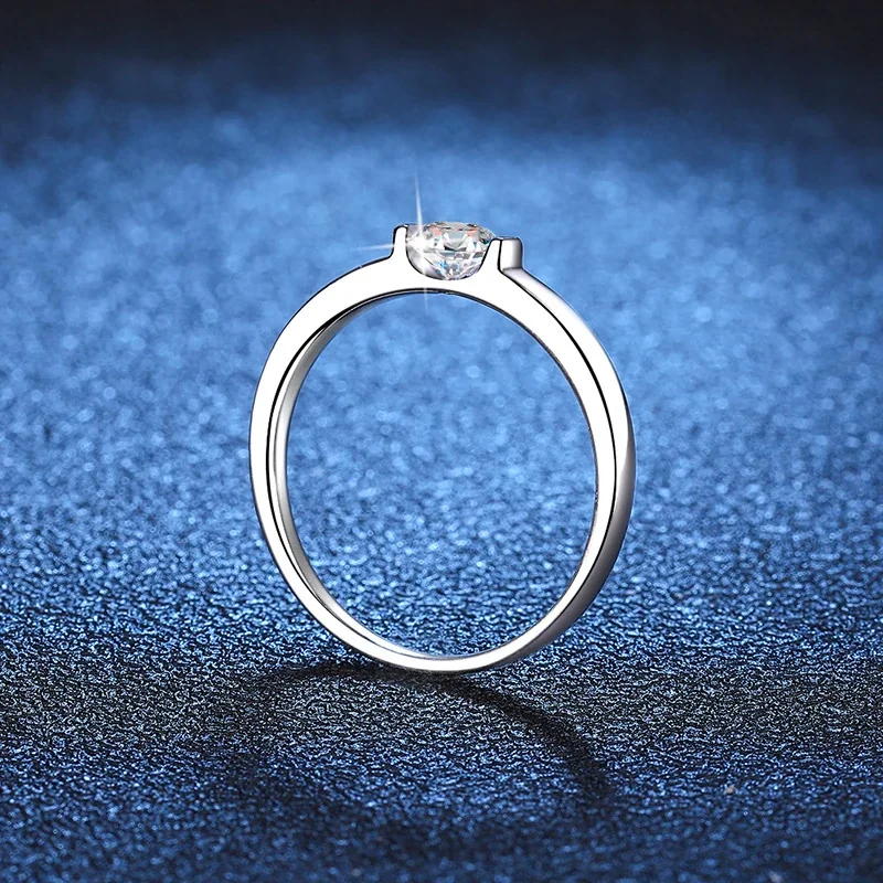 Sleek Silver-Plated 925 Sterling Silver Tension-Set Round Moissanite Ring