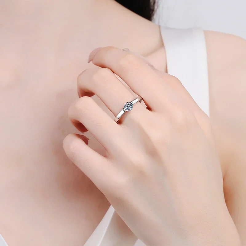 Sleek Silver-Plated 925 Sterling Silver Tension-Set Round Moissanite Ring