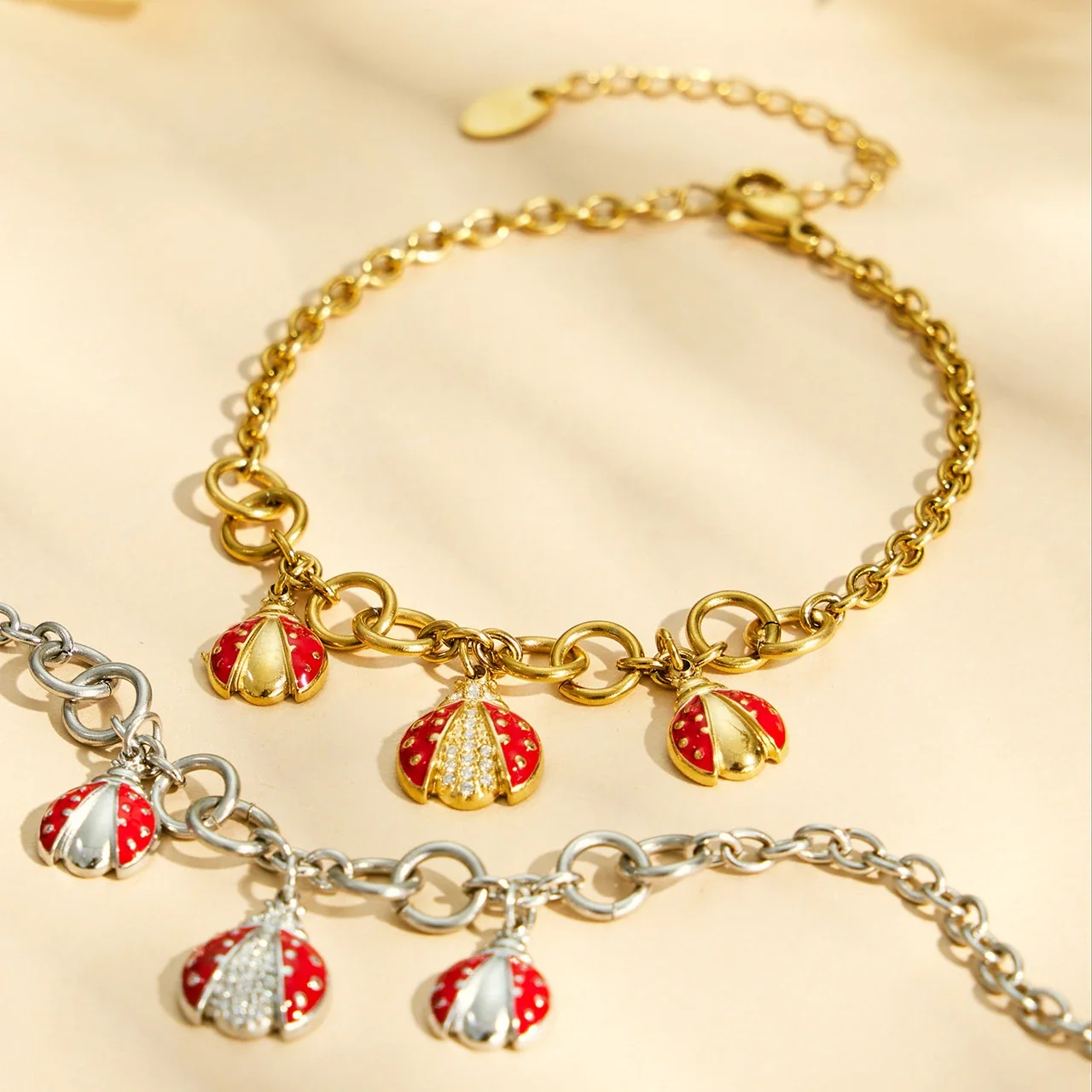 Playful Red Enamel Ladybug Charm Stainless Steel Bracelet