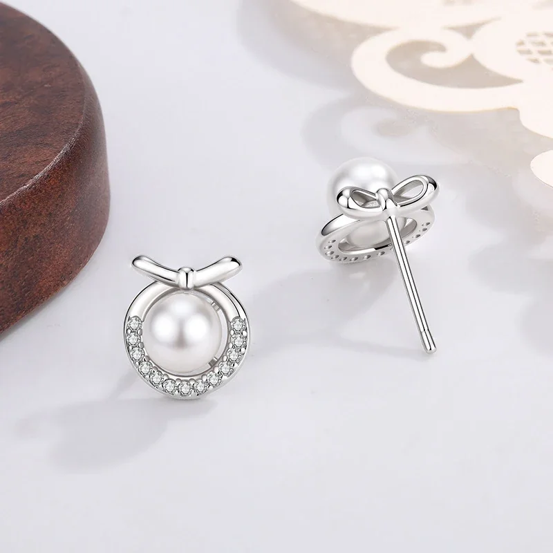 Polished Bow Crescent Pearl Pavé Stud Earrings