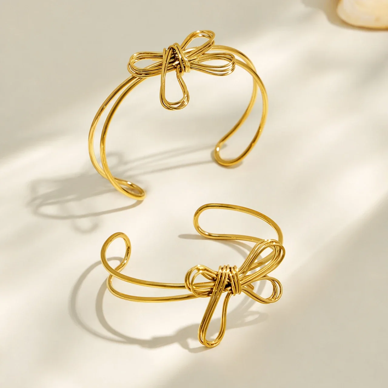 Sculptural Bow Wire Stainless Steel Open Bangle