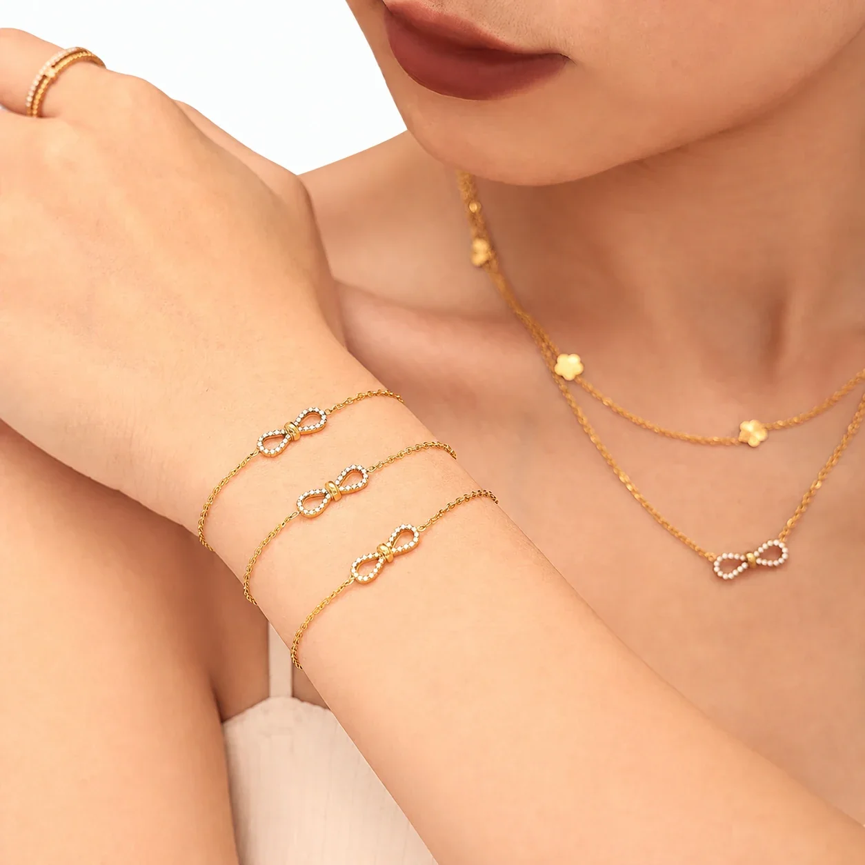 Delicate Gold PVD Pavé Bow Stainless Steel Chain Bracelet