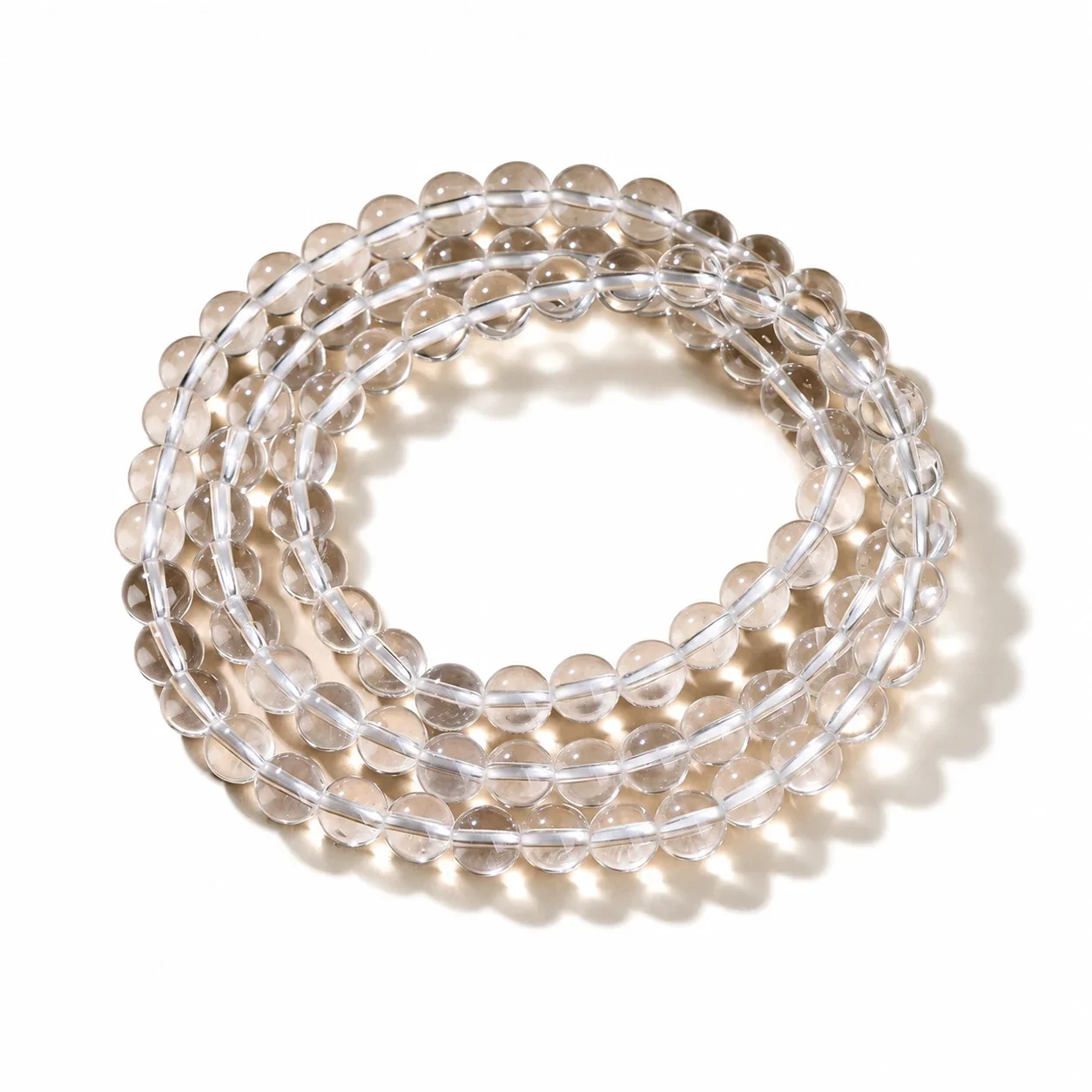 Polished Clear Round-Bead Crystal Stretch Bracelet - 7A, 6 mm, Triple Wrap, Approx. Beads