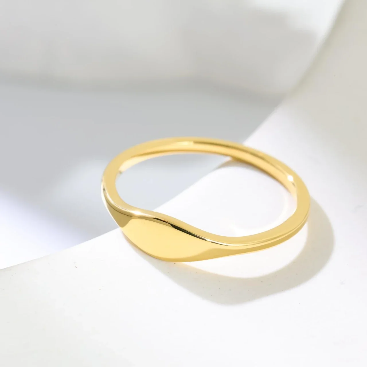 Sleek Gold-Plated Stainless Steel Tapered Oval Face Signet Ring