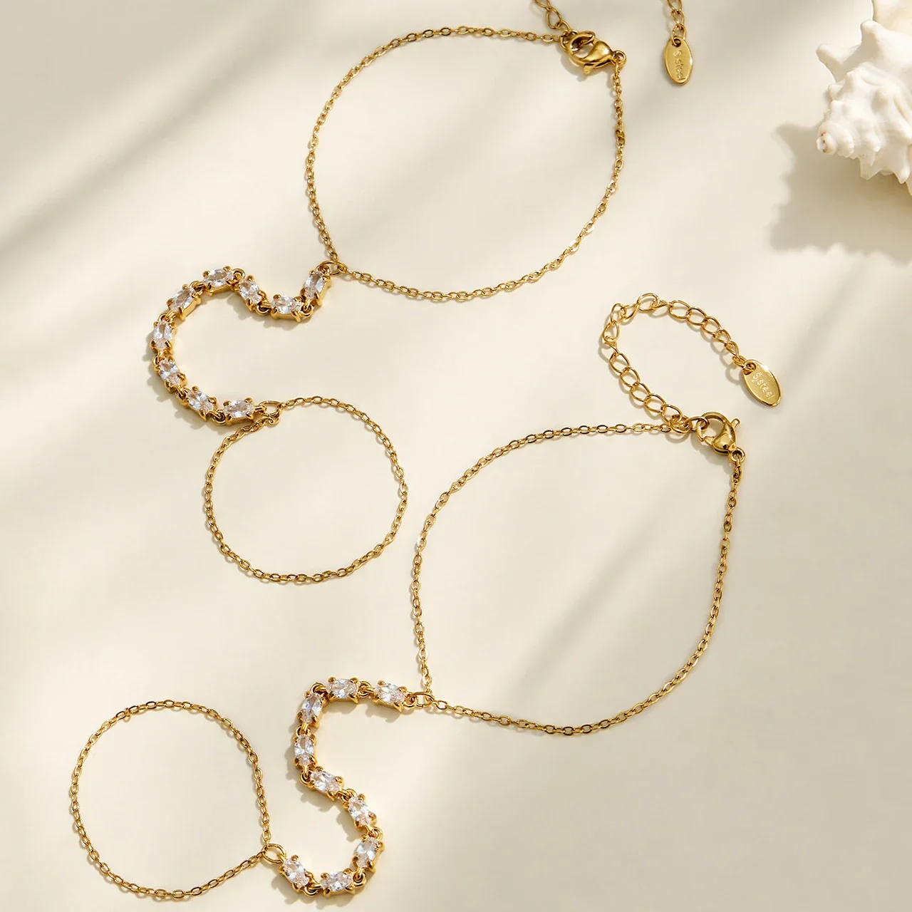 Sleek Gold-Plated CZ Wave Finger Chain Bracelet